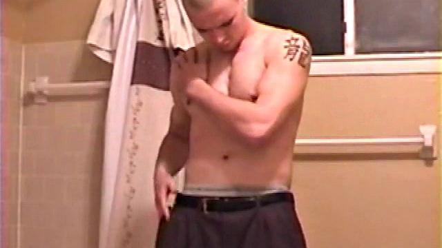After a busy day Shawn is in the bathroom getting ready to shower and decides to play with himself through his pants. He strips and flexes for the camera, while stroking his hard cock, and soon Shawn blasts a warm cum load onto his chest.