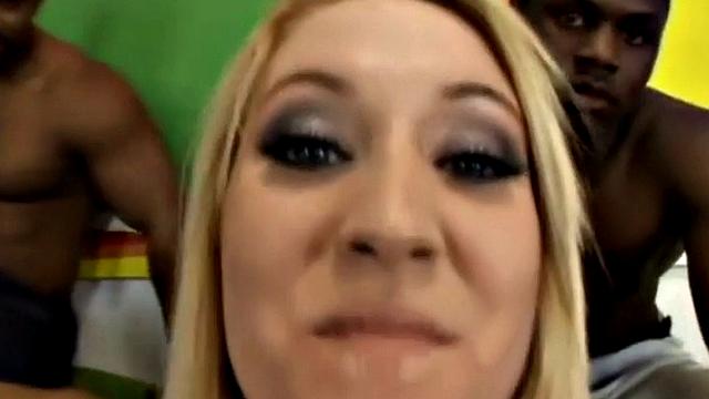 Blonde slut gets her holes stretched by multiple black cocks in a wild interracial gang bang