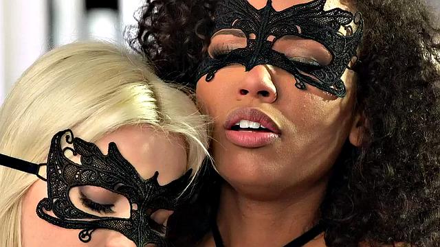 Petite masked lesbian babes licking