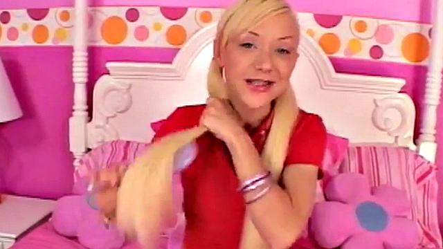Solo blonde teen slut masturbates