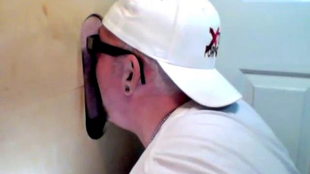 anonymous blowjob at the gloryhole in a gay booth