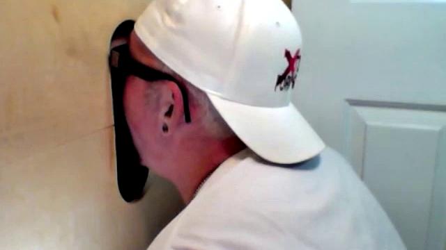 anonymous blowjob at the gloryhole in a gay booth