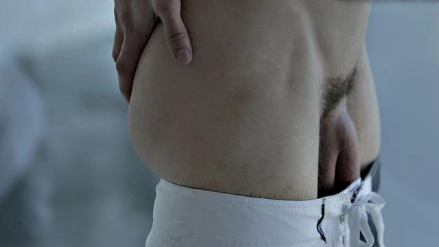 Sixpack jock teases body and jerks for cumshot