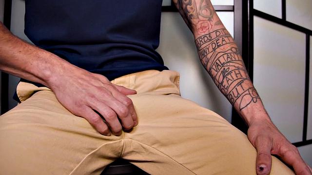 Massaging inked jock breeds stepbrother in duo