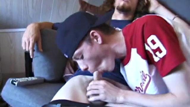We join Adam and EJ with their dicks already out and jeans down. Curious EJ leans over and starts stroking Adam's cock. Adam helps EJ out by going down on him. EJ wants to try cock sucking, so he takes Adam's cock into his mouth.