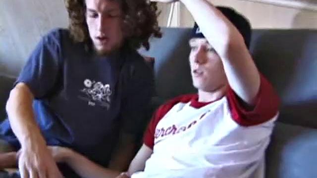 We join Adam and EJ with their dicks already out and jeans down. Curious EJ leans over and starts stroking Adam's cock. Adam helps EJ out by going down on him. EJ wants to try cock sucking, so he takes Adam's cock into his mouth.