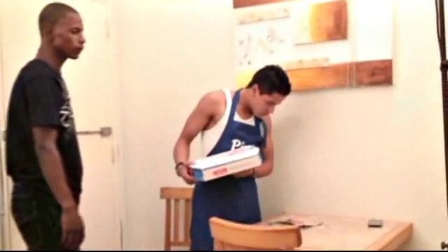 After ordering pizza, Anibal Ribeiro pulls on his dick through pants while flipping through pussy porn, leaves it on table when answering the door.