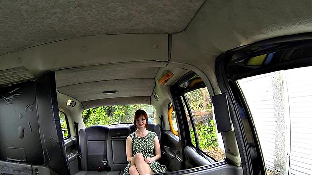 Horny redhead tempts driver with sex for taxi fare