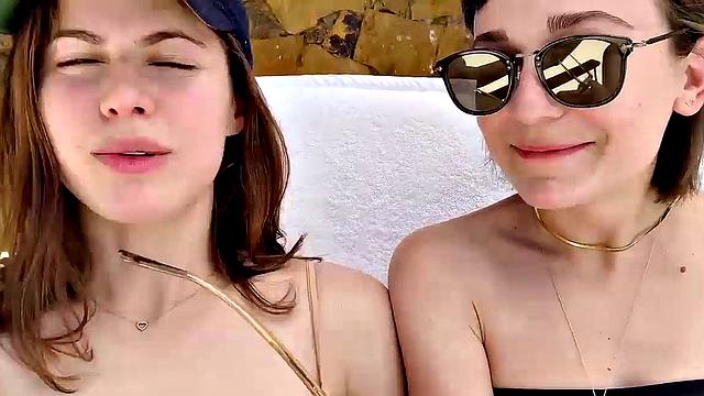 Alexandra Daddario flaunts her bikini body in the pool and shows off her smile