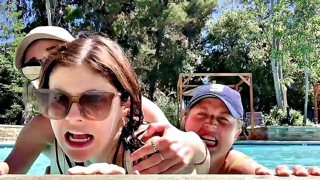 Alexandra Daddario flaunts her bikini body in the pool and shows off her smile