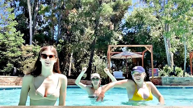 Alexandra Daddario flaunts her bikini body in the pool and shows off her smile