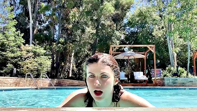 Alexandra Daddario flaunts her bikini body in the pool and shows off her smile