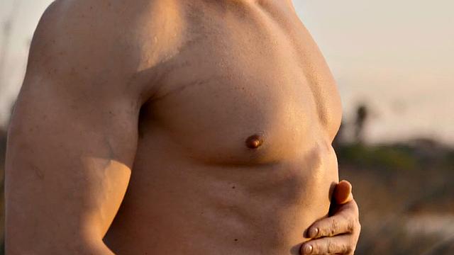 Muscular jock pounding stud on sofa after deepthroating