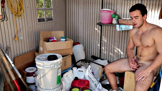 Hunky newbie removes clothes and masturbates in garage