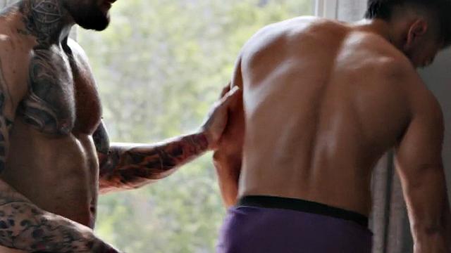 Inked muscled stud barebacks Latino lover in the bed