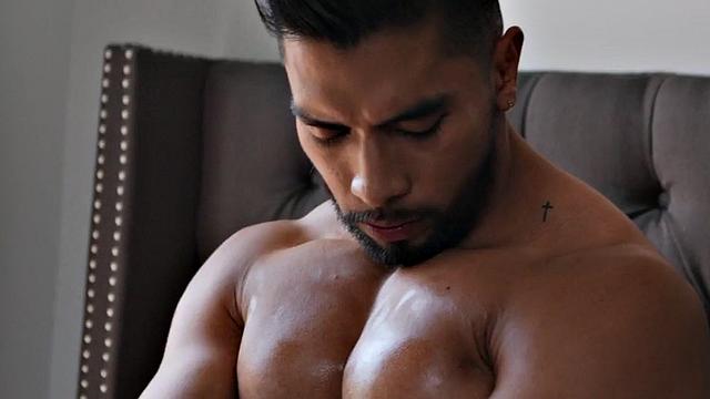 Inked muscled stud barebacks Latino lover in the bed