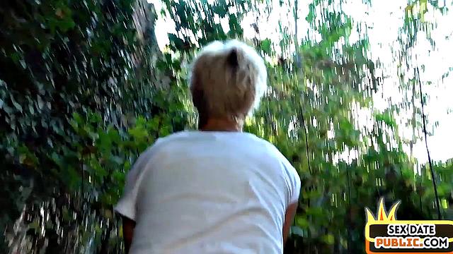 MILF deepthroating outdoors