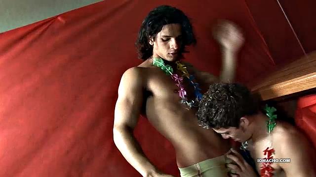 Kaike and Luiggi are a couple of cute young Latinos who met up during Carnival and have decided to escape the festivities so they can get intimate. With both boys stripped naked, Luiggi goes down on Kaike's big uncut dick and soon has him hard.