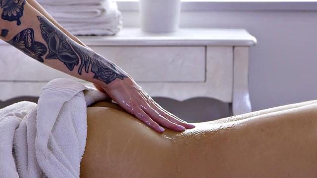 WAM inked masseuse rides client on massage table