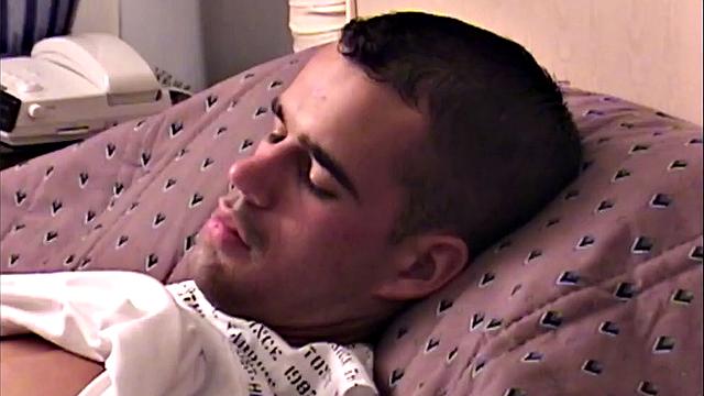 Zac is a toned young man, who is stretched out on the bed and working up a boner. Once naked and hard, he's up on his knees, stroking that cock.