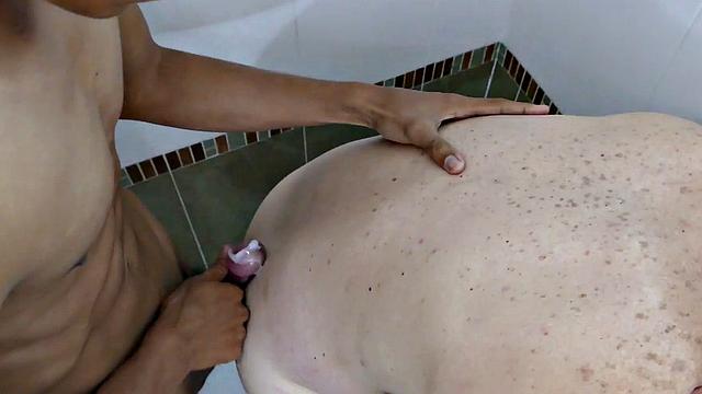 Asian stud fucks white DILF in bathtub