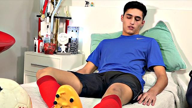 Soccer Latino twink toys ass and jerks off in action