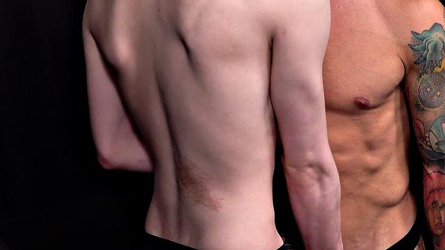 Barebacking stud with tattoos fucks sling twink