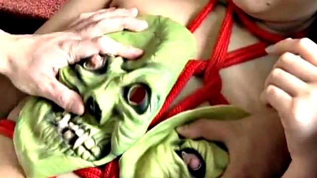 Bondage babe dominated by man