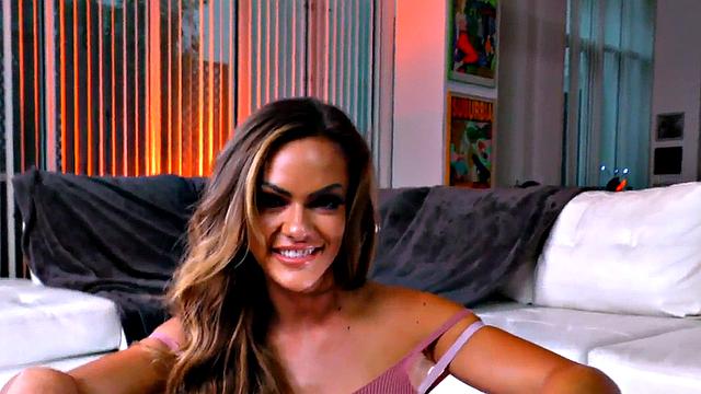 HJ babe wanks oiled cock with her hands and talks dirty