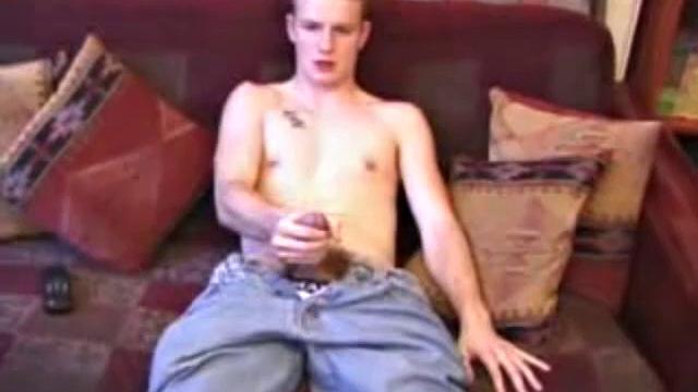 After working up a stiff one through his pants, Lex Python strips down and strokes his hard dick to a video. He lubes up his asshole and fingers it before inserting a jelly probe. Lex beats off in several positions, before shooting his load.