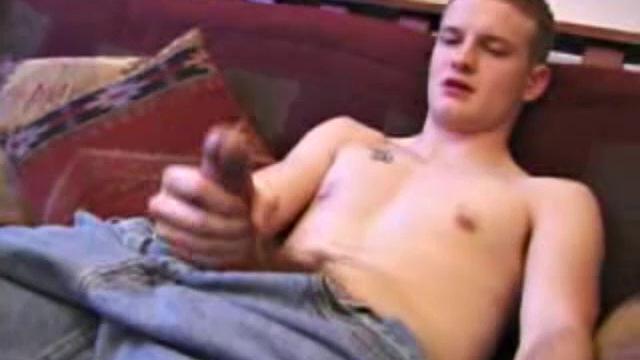 After working up a stiff one through his pants, Lex Python strips down and strokes his hard dick to a video. He lubes up his asshole and fingers it before inserting a jelly probe. Lex beats off in several positions, before shooting his load.