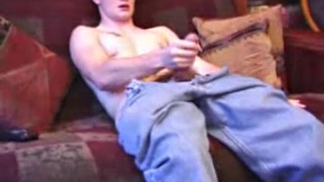 After working up a stiff one through his pants, Lex Python strips down and strokes his hard dick to a video. He lubes up his asshole and fingers it before inserting a jelly probe. Lex beats off in several positions, before shooting his load.