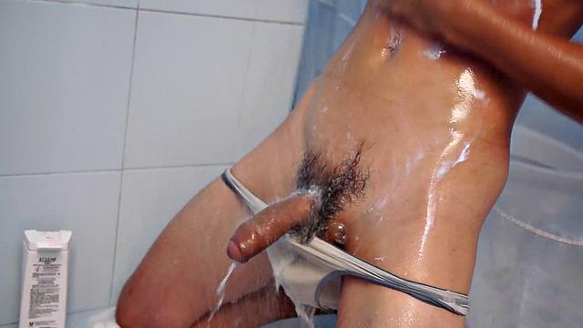 Asian twink masturbates for cum after taking a shower