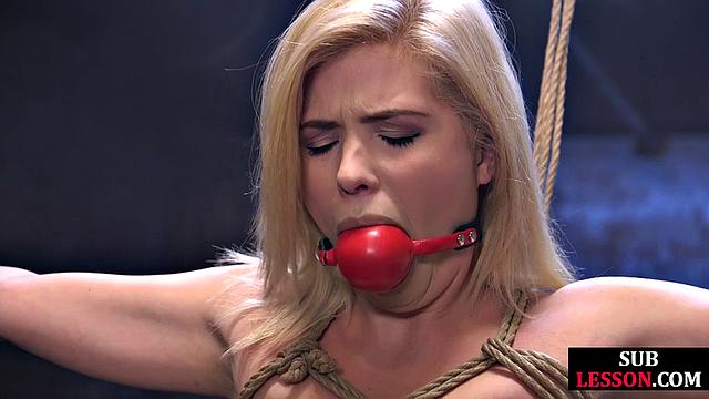 Bondage blonde doggystyled