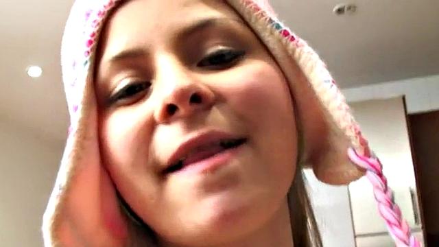 Horny blonde teen fingering her pussy