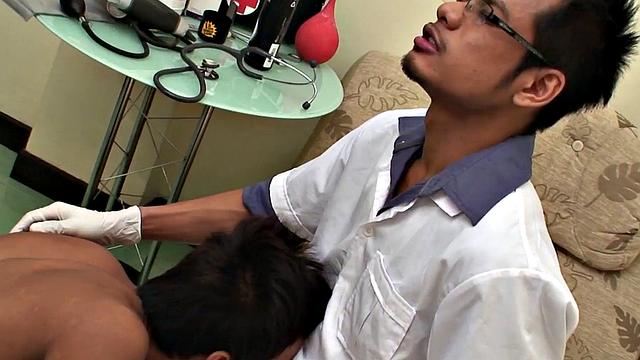 Asian twink pissing during checkup