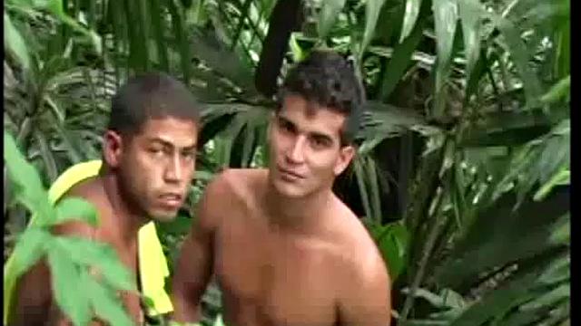 Andre Mello and Rafael Lucio are having sex in the jungle, while Ramon Mendez strokes his big cock a few meters away, until invited to join.