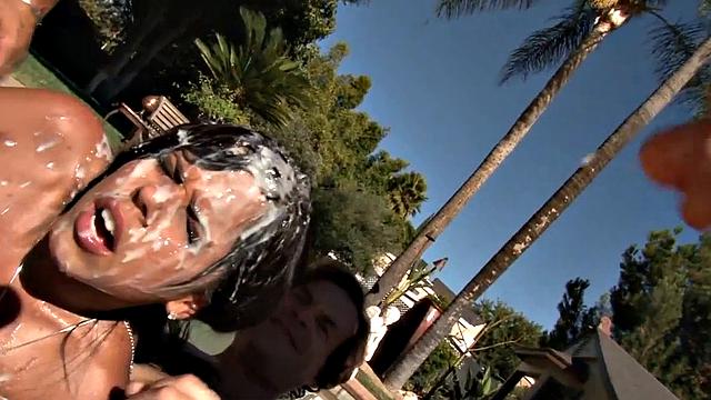 Watch Diamond Kitty's oiled-up pussy get pounded and covered in jizz