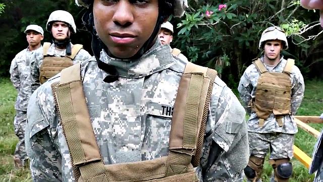 A muscular ebony soldier suck before getting fucked in an interracial group