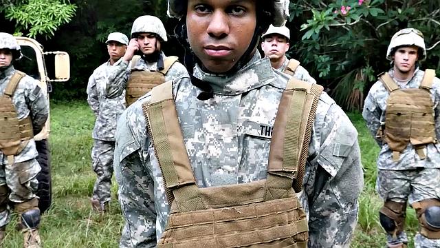 A muscular ebony soldier suck before getting fucked in an interracial group