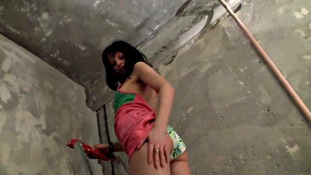 Watch Tammy tease her body with high heels on a ladder and long socks