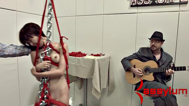 A kinky teen get dominated and face fucked while bound and wearing a mask