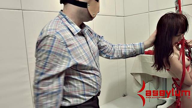 A kinky teen get dominated and face fucked while bound and wearing a mask