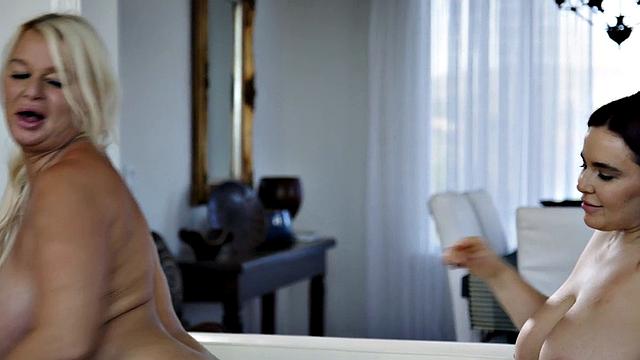 Busty lesbian MILF pussylicking her GF