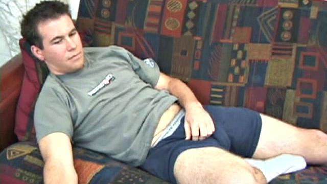 New comer pops in a porn video and slides his hands down his pants. He rubs his dick through his blue boxers, until it's stiff and ready to action. Then starts stroking his boner with determination until it releases its load.