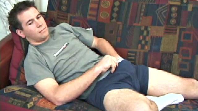 New comer pops in a porn video and slides his hands down his pants. He rubs his dick through his blue boxers, until it's stiff and ready to action. Then starts stroking his boner with determination until it releases its load.