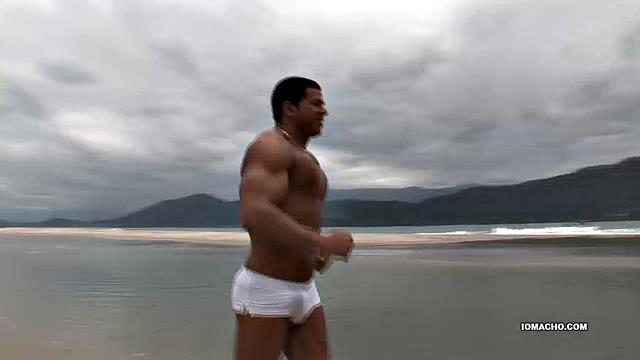 While enjoying the day on a beautiful South American island, Cristian and Junior find a secluded patch of sand to get naked and have fun.