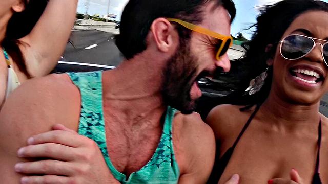 Watch these kinky babes enjoy deepthroating, pussy licking and car threesome action in the outdoors