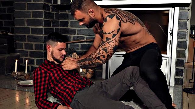 Tattooed muscle gay penetrates guy in anal hole