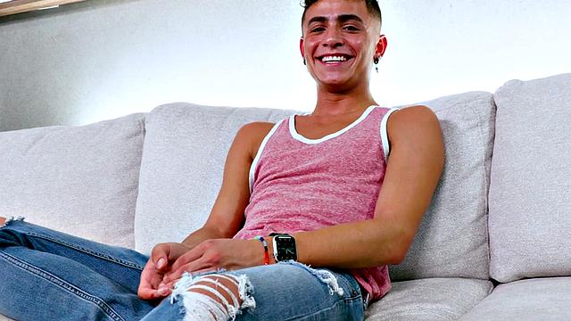 Amateur twink jerks off while dildoing and cums hard on the couch